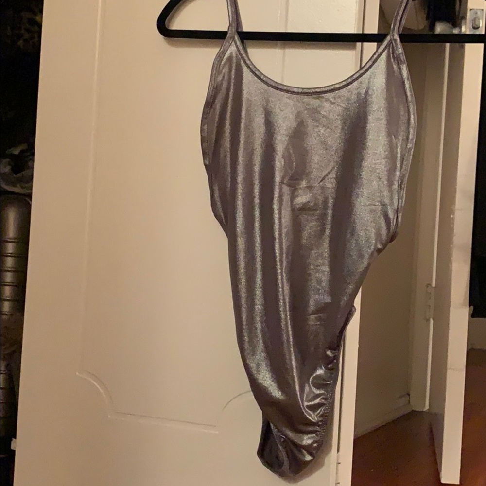 Shiny silver bodysuit